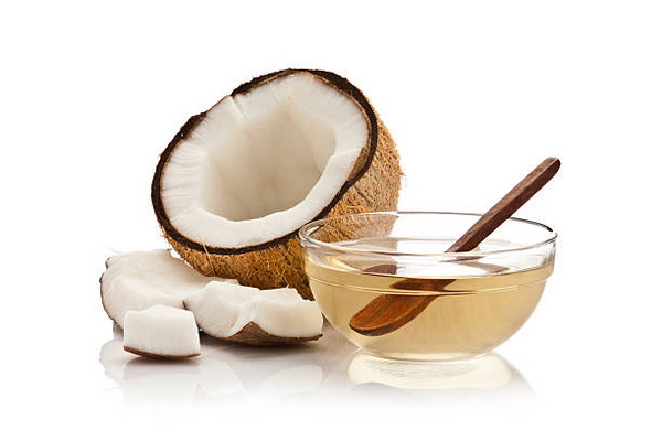 coconut oil and half coconut with pieces