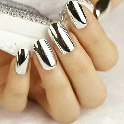 silver chrome pained nails holding a purse