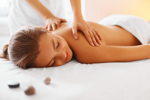 Female enjoying relaxing back massage