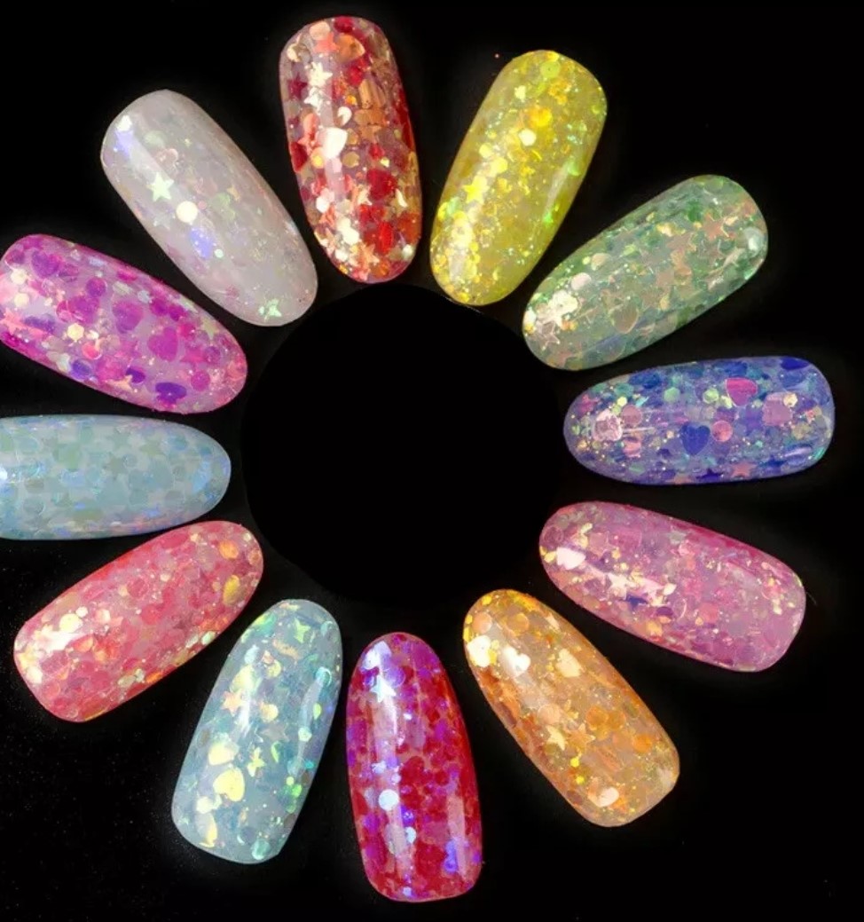 Colour wheel of confetti nails in different colours