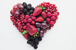 assorted berries in the shape of loveheart